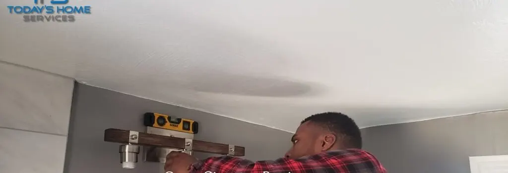 Installer working on a wall
