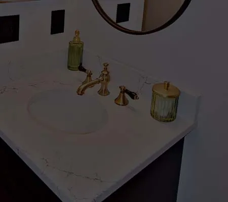 Bathroom vanity with white quartz top, undermount sink and brass faucet
